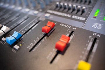 The console control panel of a large hi-fi system. audio equipment Closeup digital studio mixer...