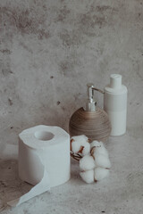 Toilet paper in the bathroom with cotton