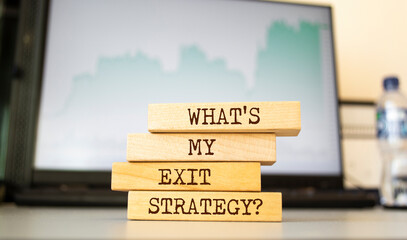 Wooden blocks with words 'What's My Exit Strategy?'.