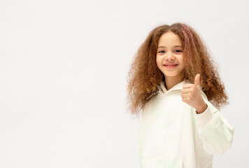 Beautiful and cute girl isolated on white background shows emotions.