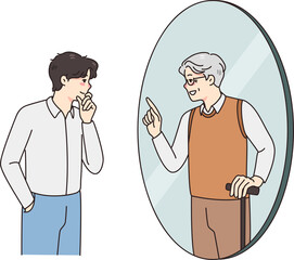 Young man look in mirror talk with old self