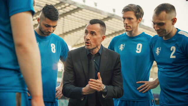 Professional Soccer Team Training, Tactical Coaching: Football Coach Explains Complex Game Strategy, Develop Workout Plan Trainer Motivates Athletes, Leads to Victory, Preparing For Championship.