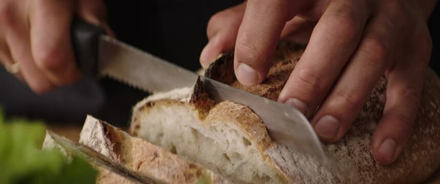 chef cutting bread