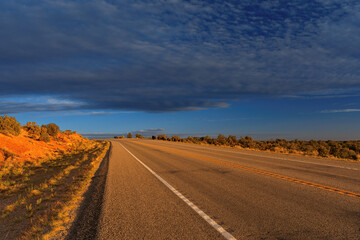 The open road at sunset in the desert