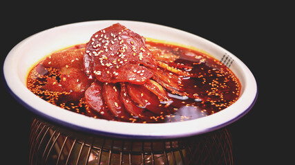 Sliced beef and ox tongue in chili sauce(Mr and Mrs Smith) or fuqifeipian,One of the top ten classic dishes in Sichuan,Appetizer of the Year - obrazy, fototapety, plakaty