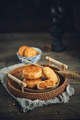 Sesame meat muffins, traditional handmade food, dark background