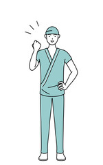 ガッツポーズをする男性入院患者