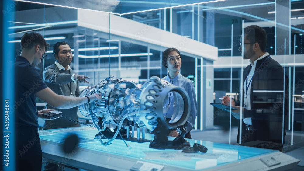 Aufkleber Young Team of Multicultural Engineers Use Blueprints, Tablet and Laptop Computers, Analyze and Discuss How a Modern Electric Turbine Motor Works. High Tech Research Laboratory with Modern Equipment.