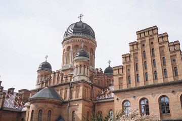 Fototapeta na wymiar Three Saints Orthodox church in National University in Chernivtsi, Ukraine. Ancient building, UNESCO World Heritage Site.