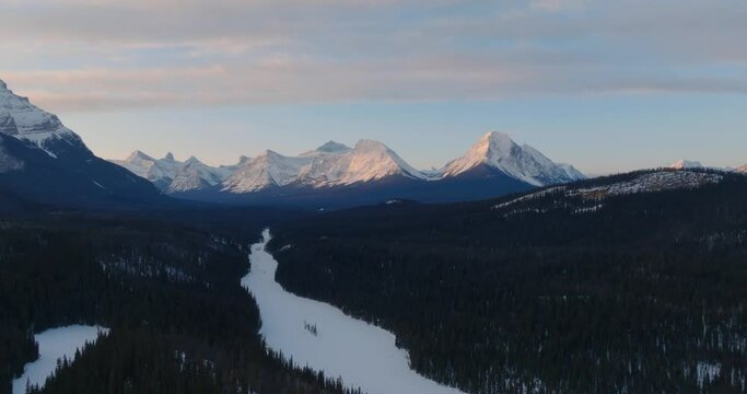 aerial morning view over athabasca river in canadian rocky mountains during winter