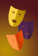 multi-colored theatrical masks made of cardboard on a yellow background, photo