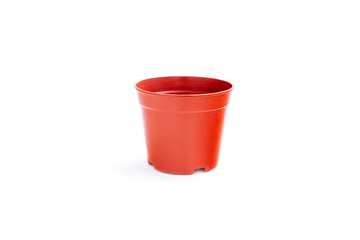 Brown plastic flower pot isolated on white background