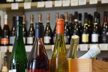 Wine bottles in wine store, restaurant, cafe, bar and ready for home delivery