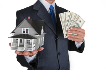 Bussinessman Holding Money and a Model House