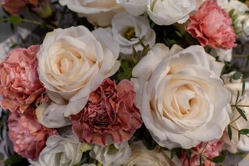 Closeup shot of the bouquet of flowers in nude colors