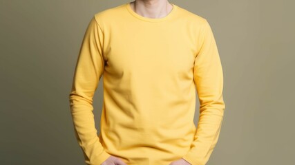 White man model wearing a plain yellow long sleeve t-shirt, isolated on a blank background. Mock-up, torso only. Generative AI illustration.