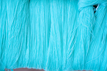 Close-up Turquoise color thai silk Yarn.