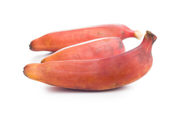 Tasty red bananas isolated on white background.