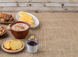 Typical brazilian june festival food over jute fabric. Festa junina with copy space