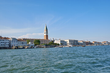 Fototapeta premium Venice: landscape with the image of boats on a channel in Venice, Italy