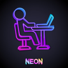 Glowing neon line Freelancer icon isolated on black background. Freelancer man working on laptop at his house. Online working, distant job concept. Vector