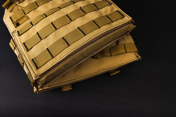 army body armor on a plain black background