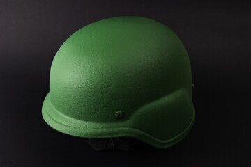 helmet military helmet on a flat black background