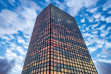 Fototapeta na wymiar Modern glass skyscraper with led facade