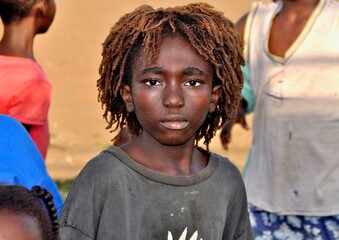Portrait of a boy with rasta hair