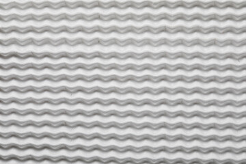 Abstract white wavy cardboard background