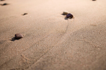 picture of rocks and sea sand.