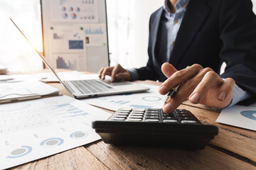 Fototapeta premium Bookkeeper or financial inspector hands making report, calculating. Home finance, tax, investment, economy, saving money or insurance concept
