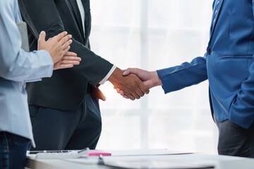 Business partnership meeting concept. Image business people handshake. Successful businessmen handshaking after good deal. Group support concept