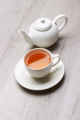 Cup of Tea on a light wooden background