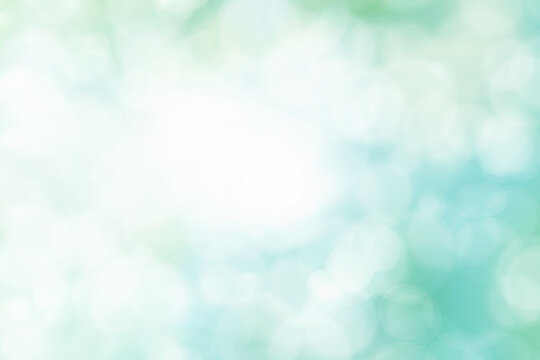 Blurred Spring Summer Nature Background with light Bokeh. Abstract blur blue and green soft pastel colors for backdrop. Defocused effect. Art clean blue cyan Illustration. Free Space for design