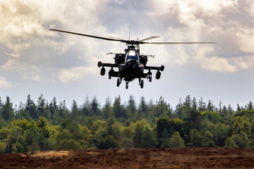 Fototapeta na wymiar Attack helicopter hovering.