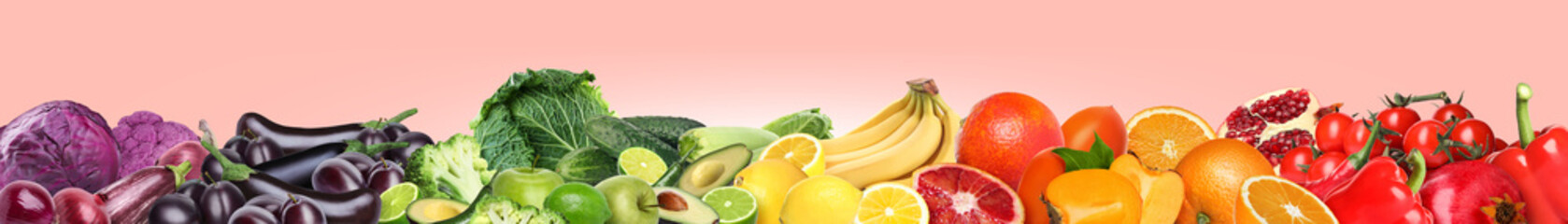 Many different fresh fruits and vegetables on pink background. Banner design