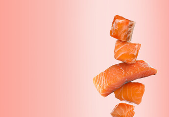 Cut fresh salmon falling on pink gradient background, space for text