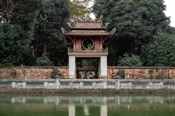 Tourist visiting Hanoi Temple of Literature. Pavilion of The Constellation of Literature
