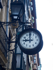 Fototapeta na wymiar Old clock in Bilbao city centre