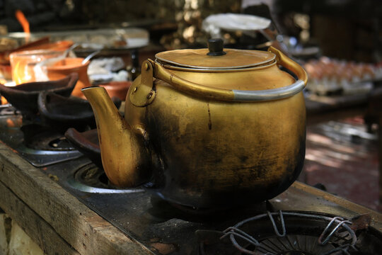 Brass Kettle on Stove