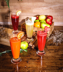 freshly squeezed juice, fruit and vegetable smoothies in glass glasses