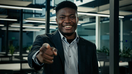 African american young male businessman confident leader employer point finger hey you hand gesture motivated smiling 30s man approve business idea explain project accept good choice approved offer