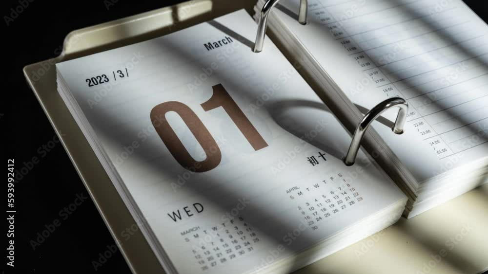 Poster time lapse of fast flipping of torn diary desktop calendar on the table
