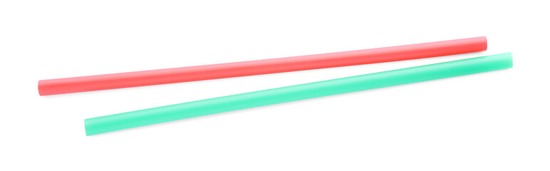 Color plastic cocktail tubes on white background