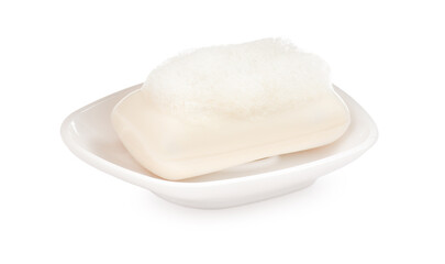 Soap bar with fluffy foam in holder on white background