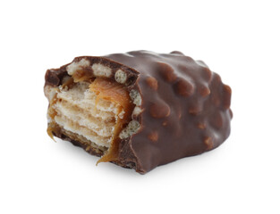 Piece of chocolate bar with caramel on white background