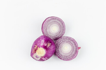 Sliced red onion isolated on white background. Top view.