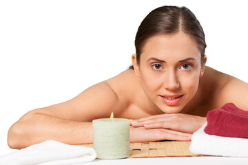 Beautiful and healthy woman relaxing in spa salon