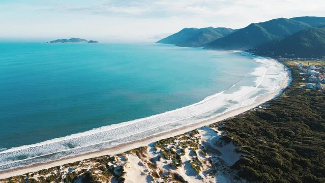 Aerial view of the Brazilian coastline with mountains near the town of Acores, on the island of Santa Catarina, Brazil